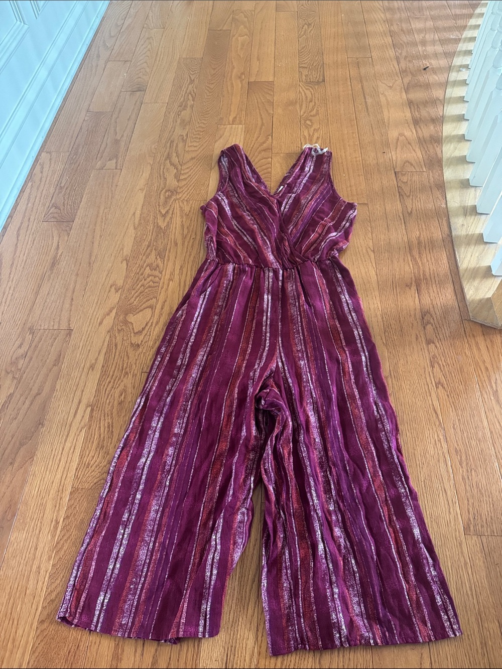 Pink jumpsuit with wrap neckline